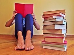 young woman reading book