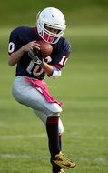 American Football player Catching Reception