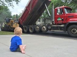Child near the truck