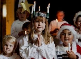 children in costumes at school christmas performance