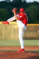 baseball player throws a ball