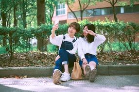 school girls taking selfie