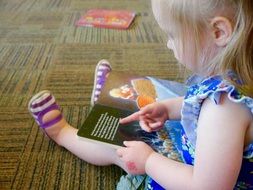 toddler Girl Reading book