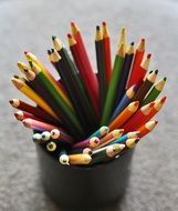 colored pencils in the cup