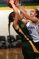 fight for the ball in basketball