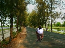 students on a bike in Thailand
