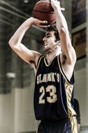 basketball player shooting a ball