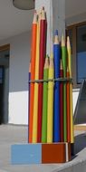 Colorful pencils on wall
