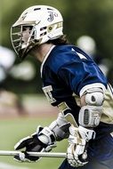 player with stick in lacrosse