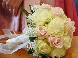 wedding bouquet with roses on the table