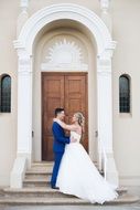 happy married couple on the stairs