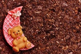 plastic toy moon and bear