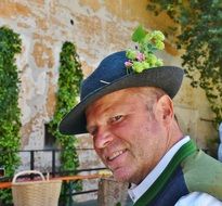 man in traditional costume at a festival in Bavaria