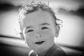 portrait of a happy child in summer