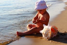 Happy Todler on Sea Beach at water