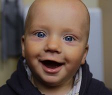 happy caucasian child boy with open mouth