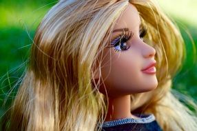 face doll with blond hair close up