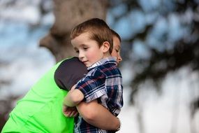 the two brothers hug