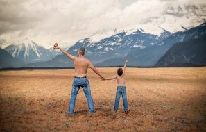 picture of the Father and son on a meadow