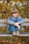 girl sitting on a bench