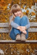 photo of girl on the bench