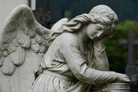 sad angel, sculpture on cemetery