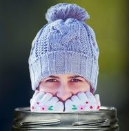 portrait of a cute girl in a blue hat