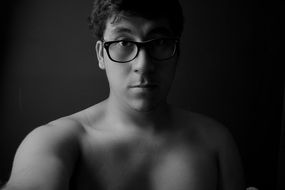 Black and white portrait of a man with the glasses