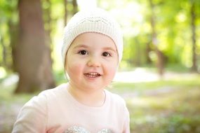 happy little girl in spring park