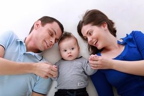 photo of a young family on a white background