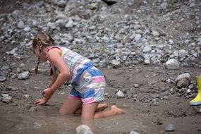 girl on the muddy beach