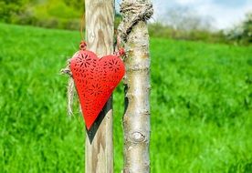 Red Heart shape decoration on pole