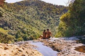 girls in bikini in the mountains on a sunny day