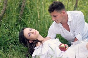 couple in snow white dresses outdoor