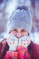 girl in a hat and mittens