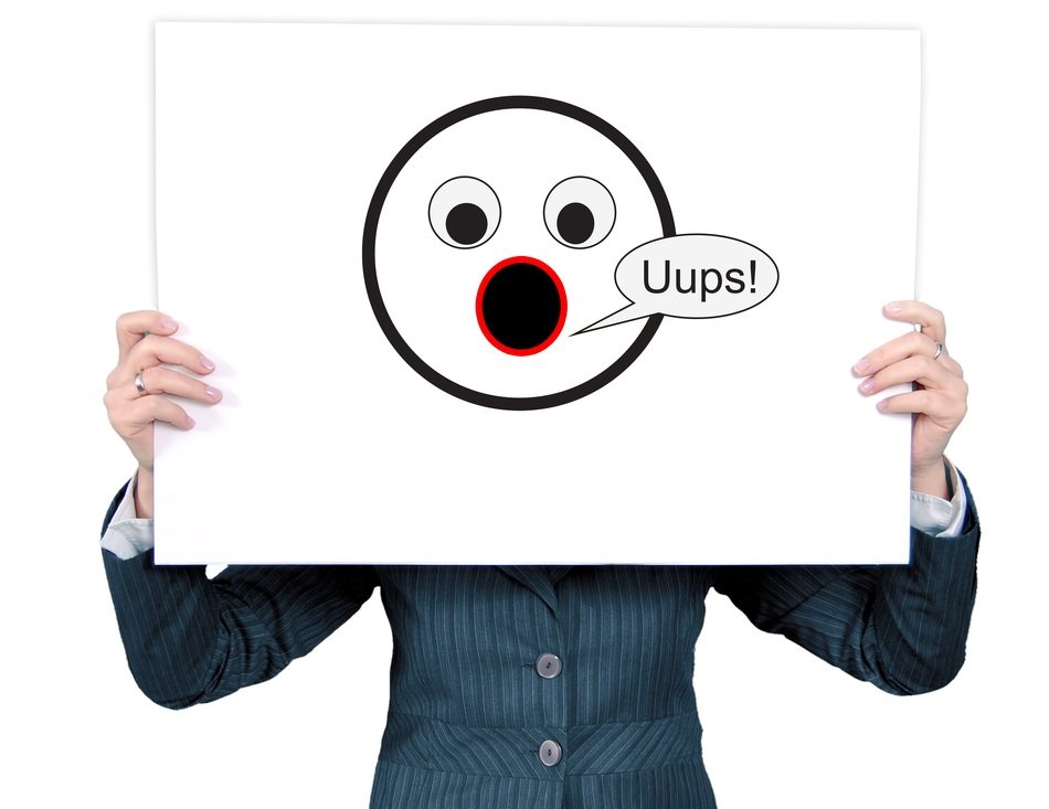 uups! picture of excuse me smiley in front of woman