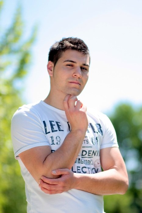thoughtful brunet in the park