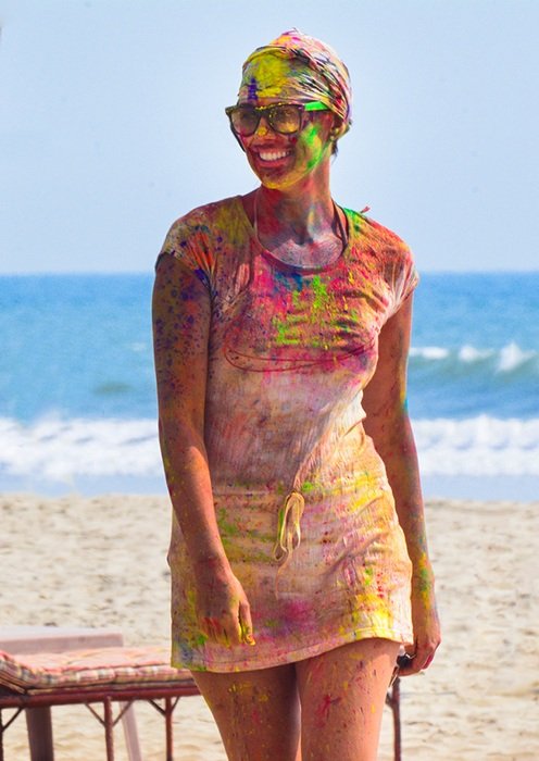girl in bright colors on the beach