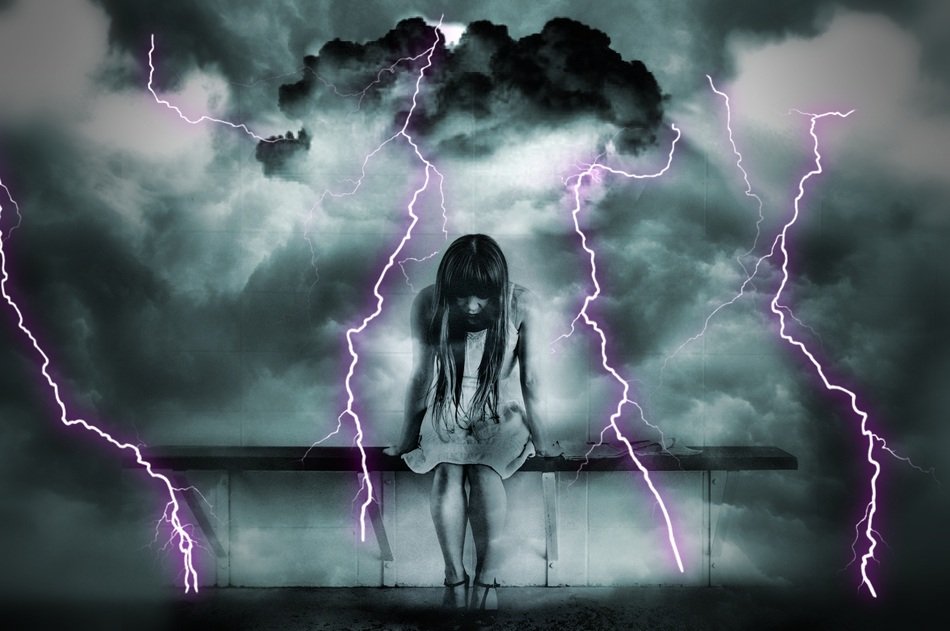 girl on a dark background with lightnings