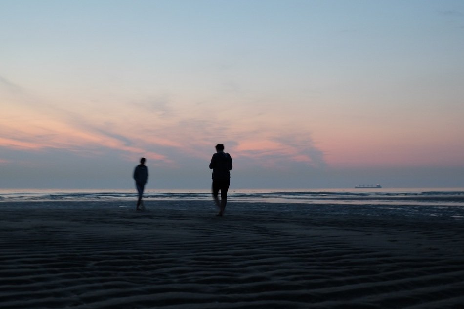 silhouette of people on the beach