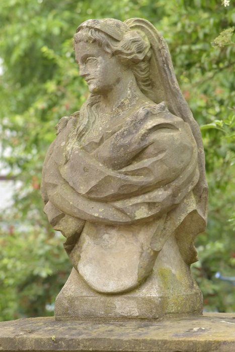 Stone Woman Figure