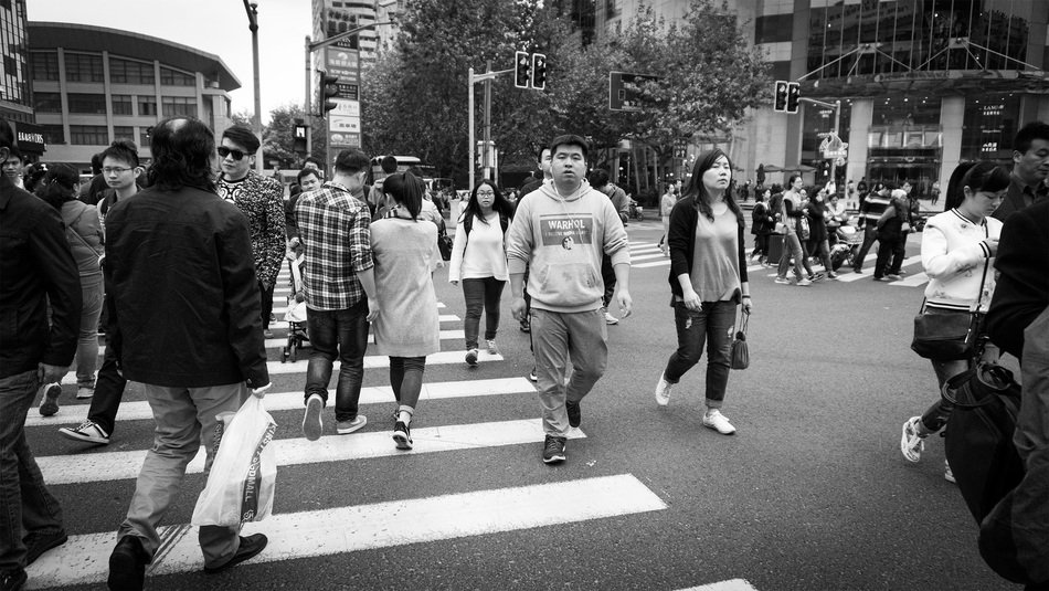 crowded pedestrian crossing in shanghai