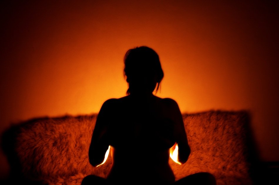 silhouette of a woman on a red background