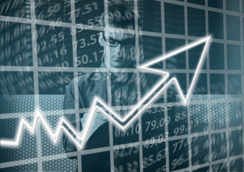 arrow on the graph against the background of a young man