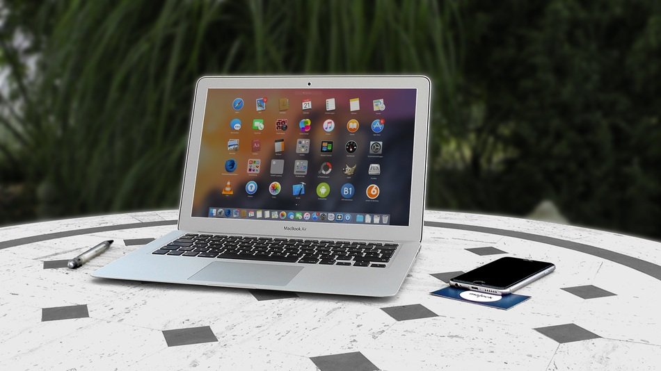 Laptop and phone on the table