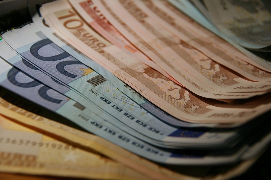 Euros, pile of bills close up