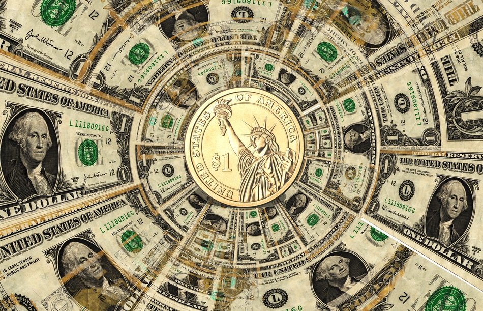 coin on the background of dollar bills