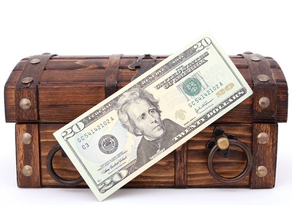 20 dollars banknote and wooden box