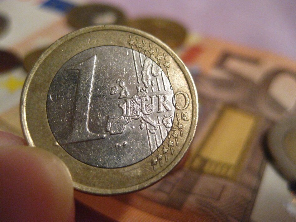 Metal Euro in hand