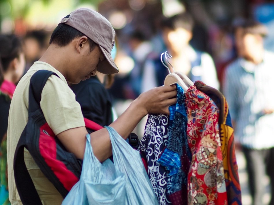 selling clothes on the street in Dali